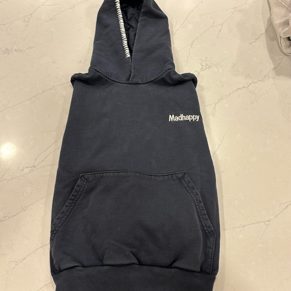 Original MadHappy hoodie. Woman’s car